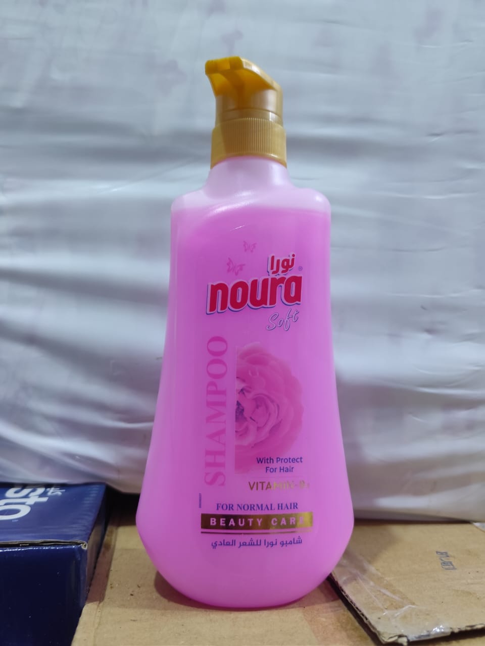 شامبو نورا صغير لون زهري
